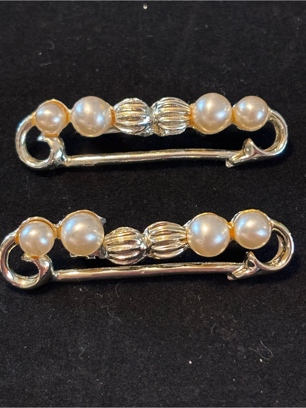 Two gold bar brooches with pearl accents